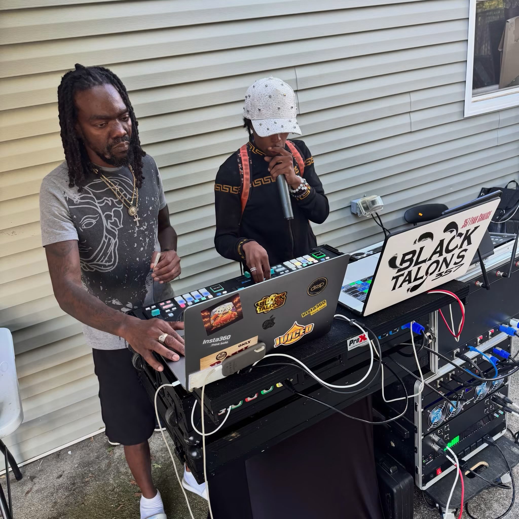 Shorts Temper at the DJ setup
